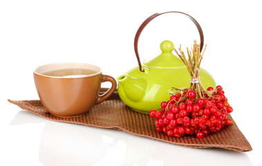 tea with red viburnum isolated on white