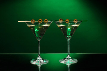 Martini glasses on dark background