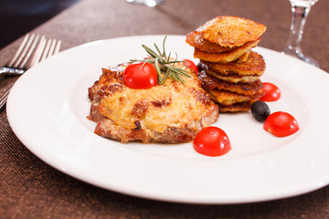 meat with potato pancakes