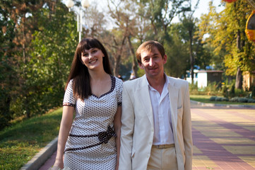 Fototapeta premium Happy young pair on walk