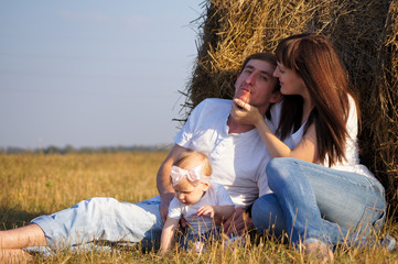 Young happy family on walk