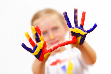 happy child with paint on the hands