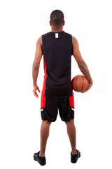 Basketball player from back, isolated in white background