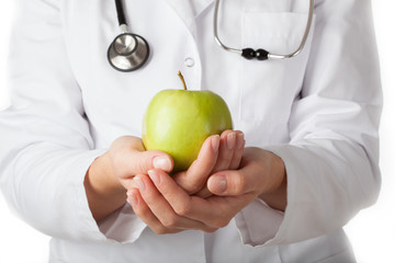 Doctor holding the apple