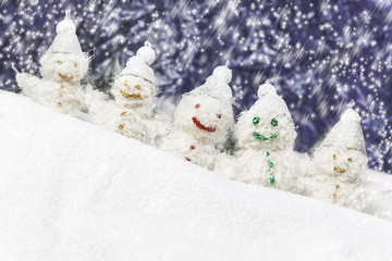 family is happy snowmen