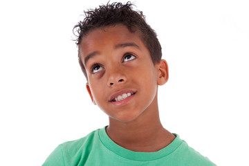 Portrait of a cute african american little boy looking up