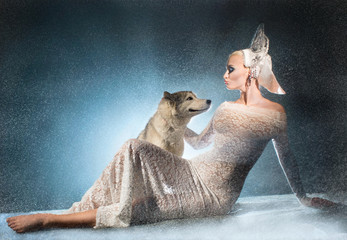 Snow maiden with dog