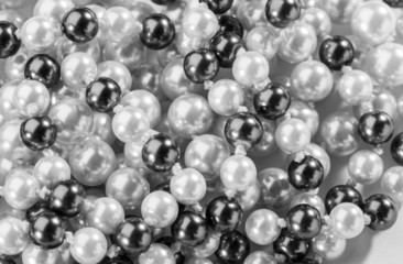 String of black and white pearls