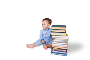 child and stack of books