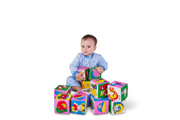 Baby boy with soft cubes