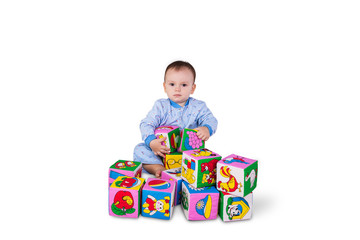 Baby boy with soft cubes