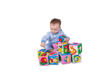 Baby boy with soft cubes