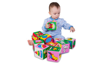 Baby boy with soft cubes
