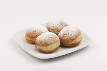 donuts on a white plate