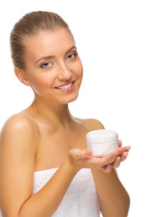 Young healthy girl with body cream jar