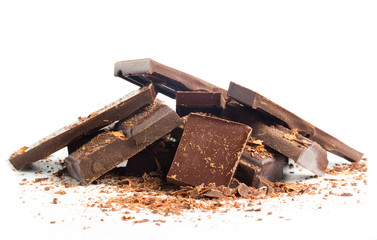 chocolate pieces with nuts on white background