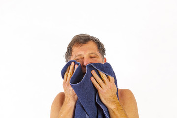 Man toweling hair after shower