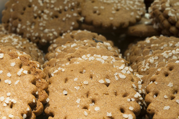Delicious shortcake with piece of nuts at the bakery display