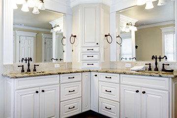 Luxury large white master bathroom cabinets with double sinks. - obrazy, fototapety, plakaty