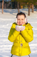 Girl holding snow