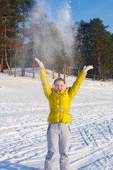 Girl throwing snow