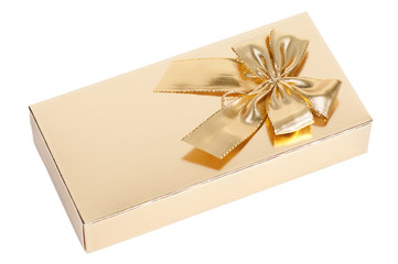 golden gift box with a bow on a white background