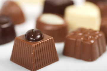 close-up of chocolates on a white background
