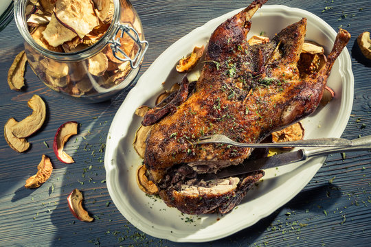 Homemade roasted duck served hot on the table