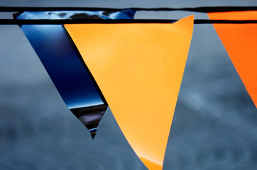 orange and blue triangular pennants
