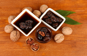 jam of walnutsjam walnuts in a bowl  on wooden table