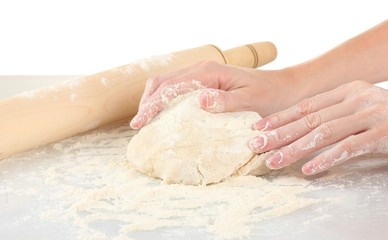 Preparing pizza dough isolated on white