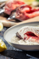 Close-up of fresh fish in batter ready for frying