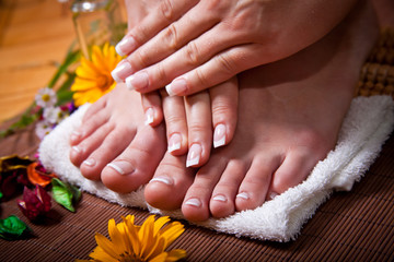 Woman's french manicure and pedicure 