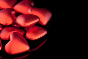 Red Hearts on Black Glass