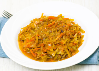 stewed cabbage on white plate