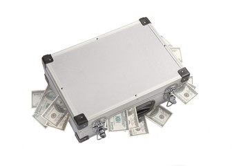 dollar banknotes sticking out of an aluminum suitcase