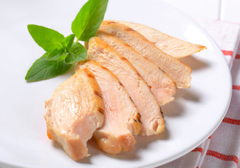 Slices of grilled chicken breast