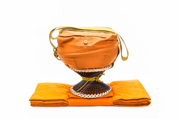 Alms bowl and robes of Monk.