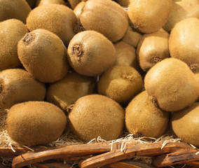 basket of kiwi fruit at market