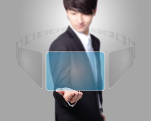 Business man holding a touch screen