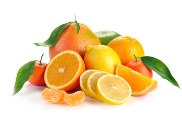 set of citrus fruit with leaves