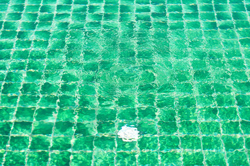 Obraz premium Swimming pool floor under water ripple.