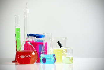 Laboratory glassware with colorful chemicals