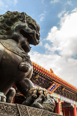 Bronze lion statue at the summer palace © pwollinga