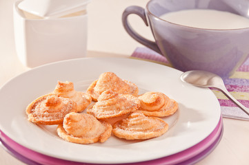 Homemade puff pastry cookies with milk
