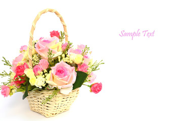 Fototapeta na wymiar Bouquet of roses in white basket with space for text