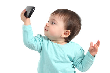 Baby watching a mobile phone