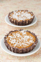chocolate tartlets with cream closeup selective focus