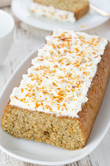 orange cake with cream cheese frosting, top view