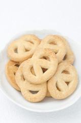 sugar cookies in a white bowl, top view